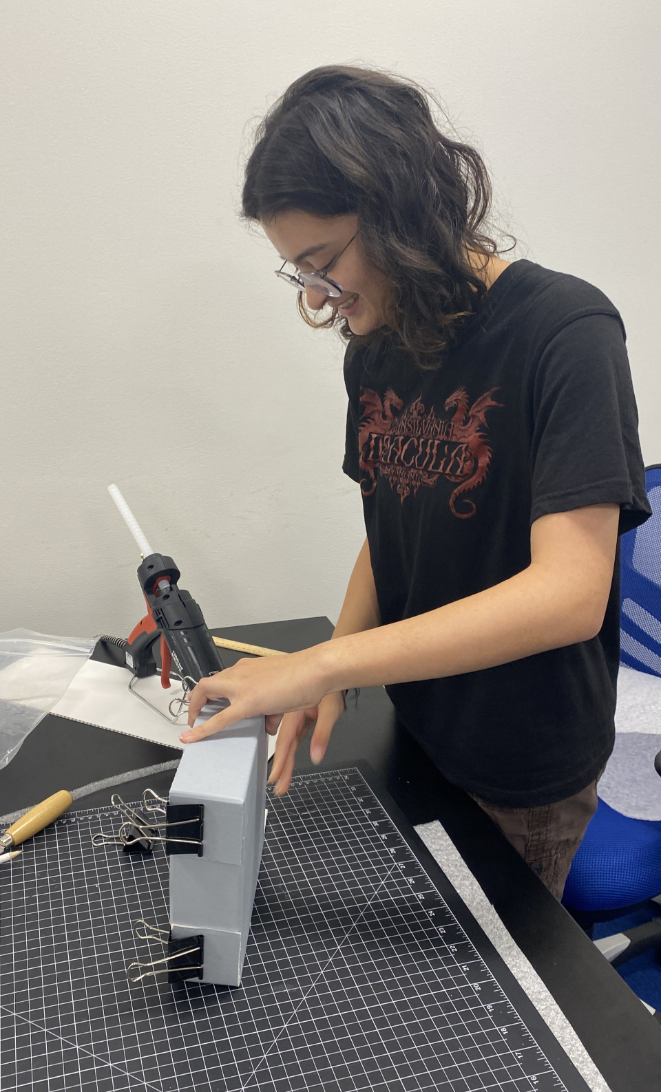 student making archival storage tray