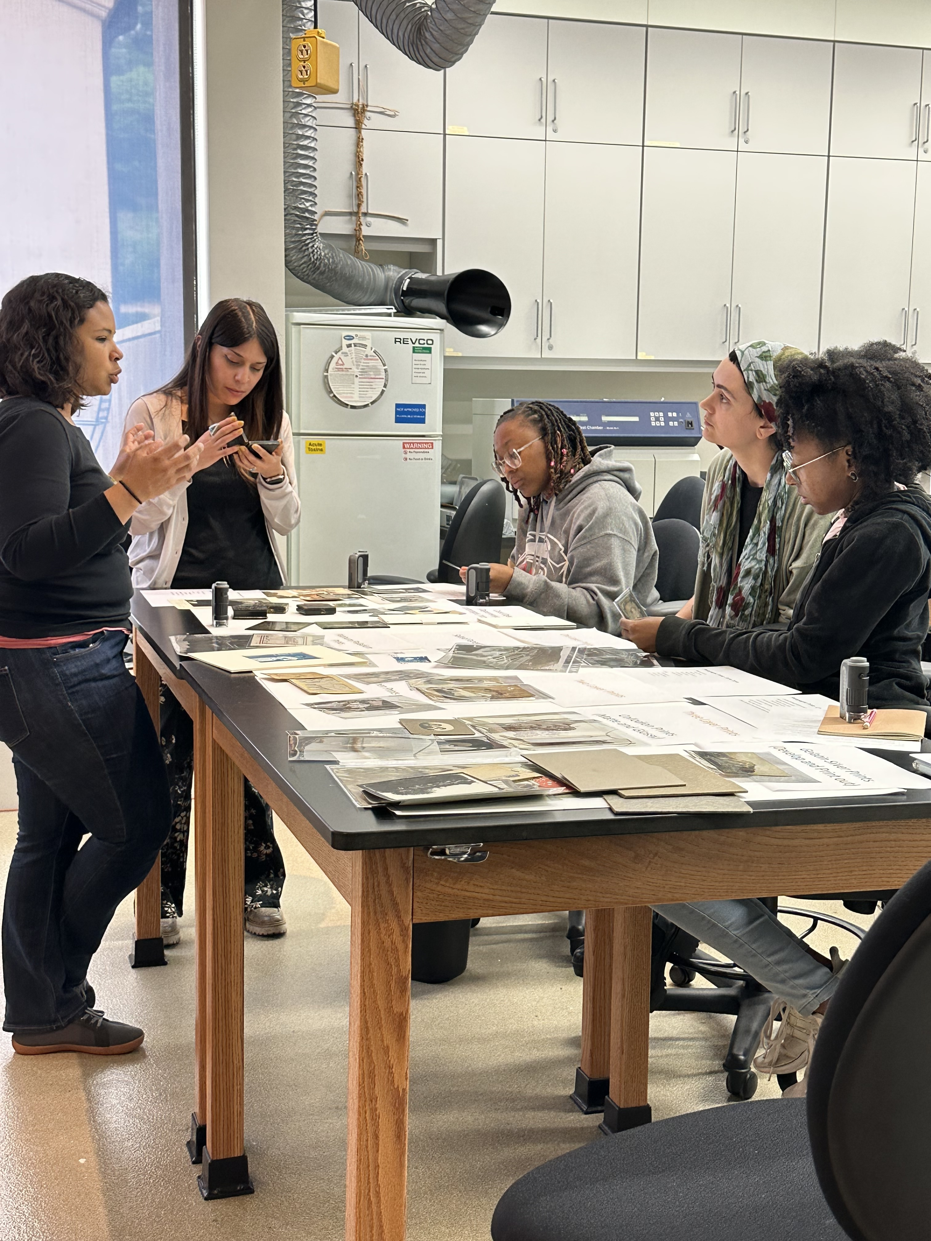 Ronel Namde teaching paper conservation 